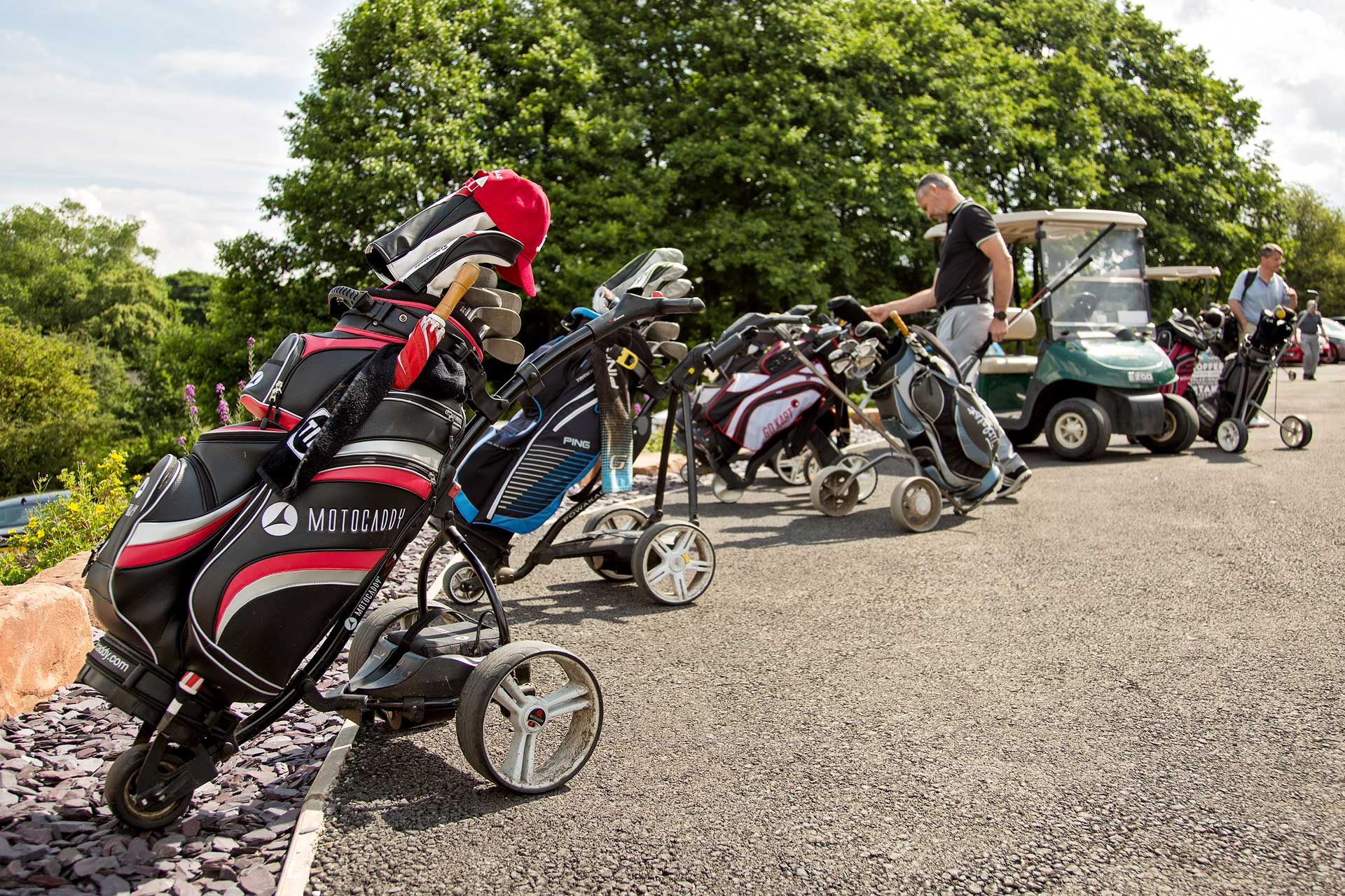 Golfing Event - golf buggies lined up