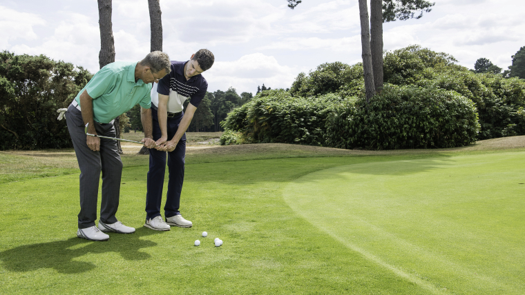 a-golfer-getting-a-chipping-lesson