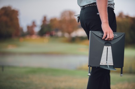 Holding a Trackman 4